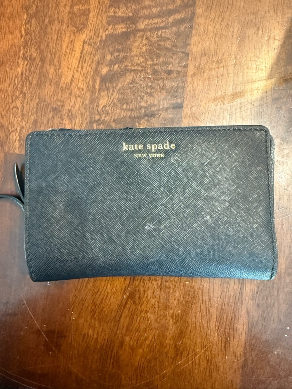 kate spade black saffiano zip wallet with gold logo